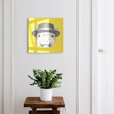 Wall mounted key box A cheerful yellow pig in the background