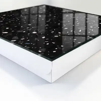 Wall mounted key cabinet Black terrazzo in the background