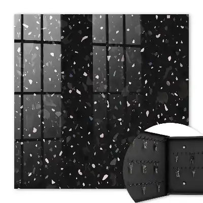 Wall mounted key cabinet Black terrazzo in the background
