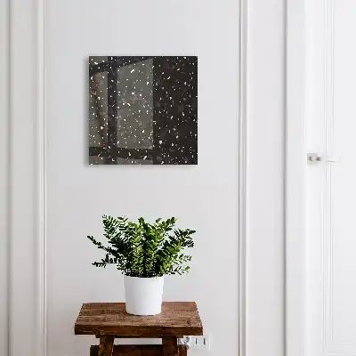 Wall mounted key cabinet Black terrazzo in the background