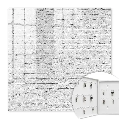 Wall mounted key cabinet Brick wall with a rough texture