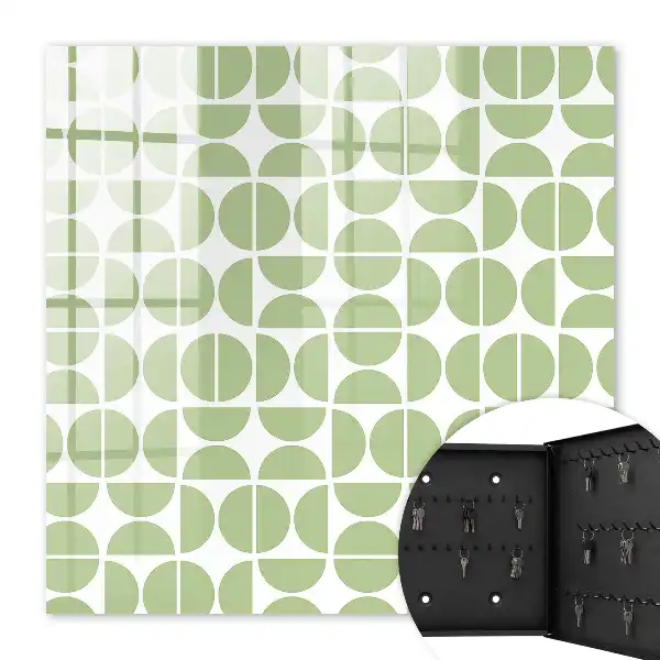 Wall mounted key cabinet Green geometry on white background