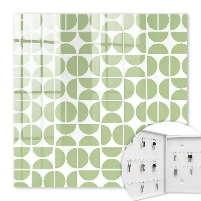 Wall mounted key cabinet Green geometry on white background
