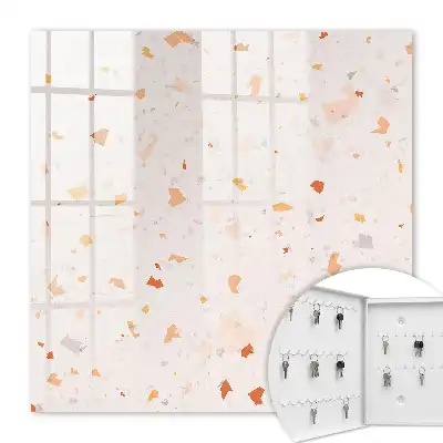 Wall mounted key box An elegant mosaic of warm colors