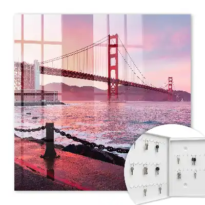 Wall mounted key cabinet The city bridge in pink colors