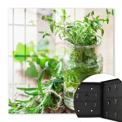 Wall mounted key box Green herbs in a wooden vessel