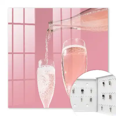 Wall mounted key cabinet Champagne glasses with pink background
