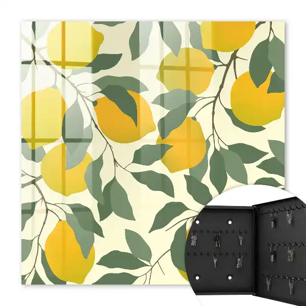 Wall mounted key box Juicy lemons in the light background