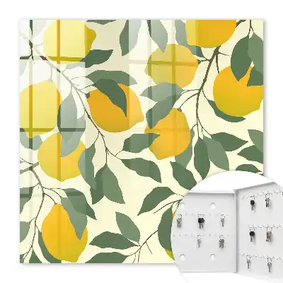 Wall mounted key box Juicy lemons in the light background