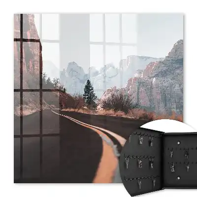 Wall mounted key box Road in the mountains, blue sky