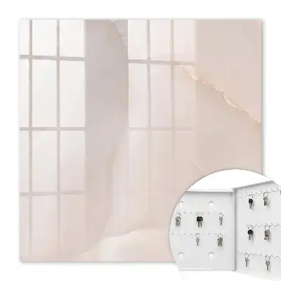 Wall mounted key cabinet Elegant texture, creamy structures