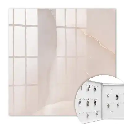 Wall mounted key cabinet Elegant texture, creamy structures