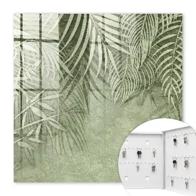 Wall mounted key cabinet Subtle tropical pattern in the background