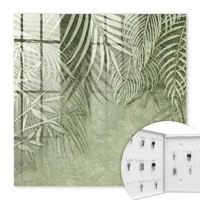 Wall mounted key cabinet Subtle tropical pattern in the background