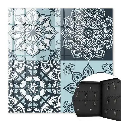 Wall mounted key cabinet Geometric patterns in cool tones