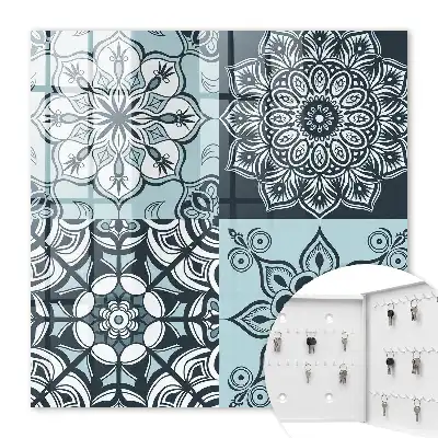 Wall mounted key cabinet Geometric patterns in cool tones