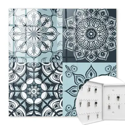 Wall mounted key cabinet Geometric patterns in cool tones