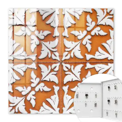 Wall mounted key box Orange plant motif in the background