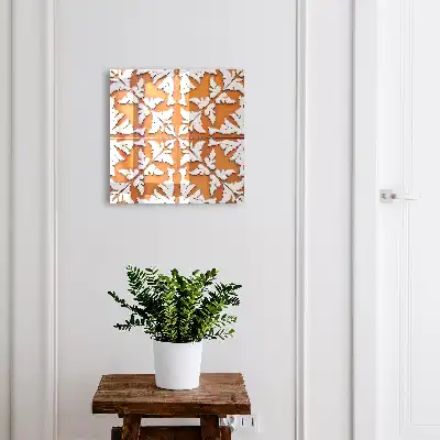 Wall mounted key box Orange plant motif in the background