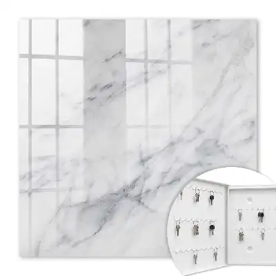 Wall mounted key cabinet Marble elegance with a white background