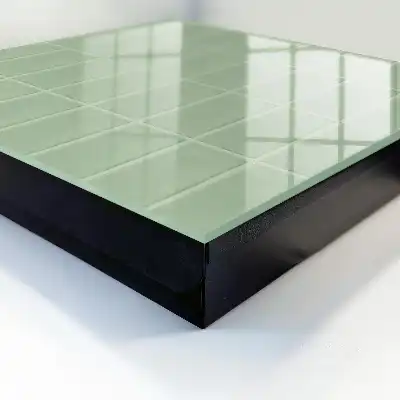 Wall mounted key box Green tiles in a symmetrical arrangement