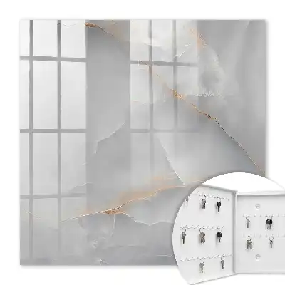 Wall mounted key cabinet Gray elegance with warm accents