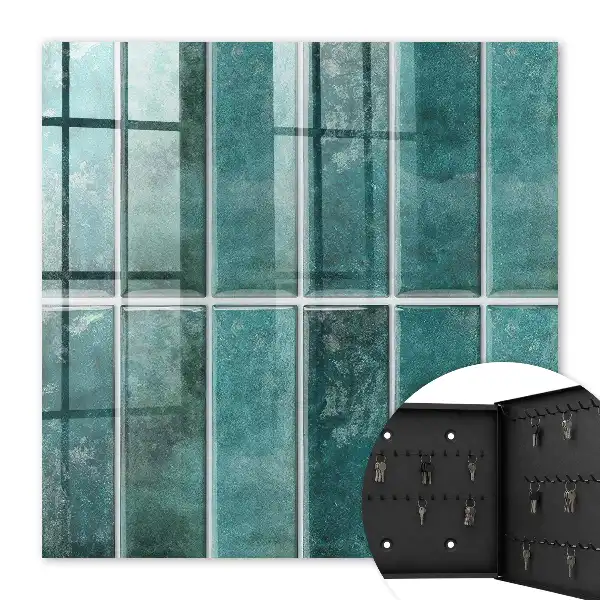 Wall mounted key cabinet Turquoise tiles enrich the space