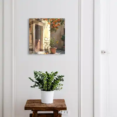 Wall mounted key box Orange retreat with a background of stones