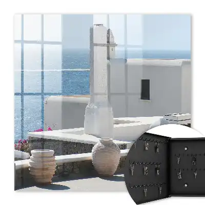 Wall mounted key box Greece white houses by the sea peaceful