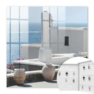 Wall mounted key box Greece white houses by the sea peaceful
