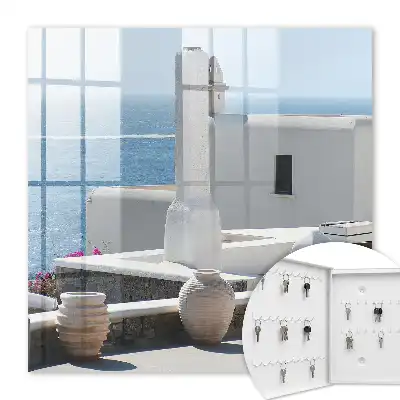 Wall mounted key box Greece white houses by the sea peaceful