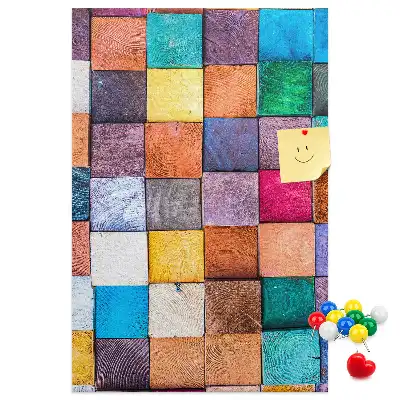 Wall cork memo board with colorful wooden blocks