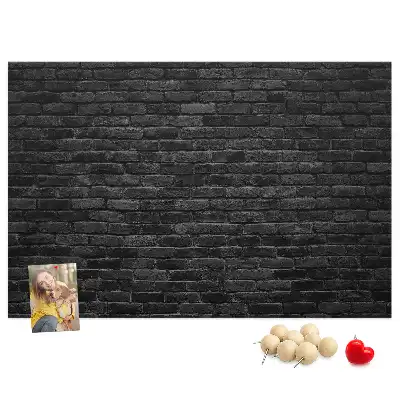 Printed cork board with dark brick wall pattern