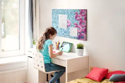 Cork memo board featuring dandelions and flamingos