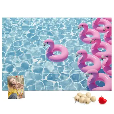 Cork memo board featuring dandelions and flamingos