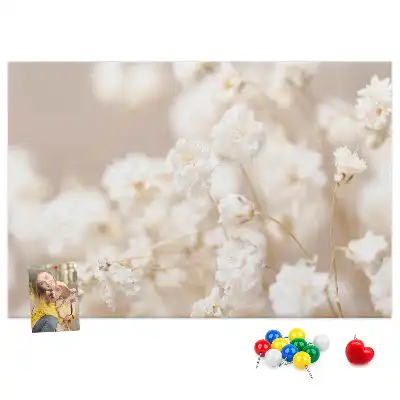 Small printed cork board with white flowers