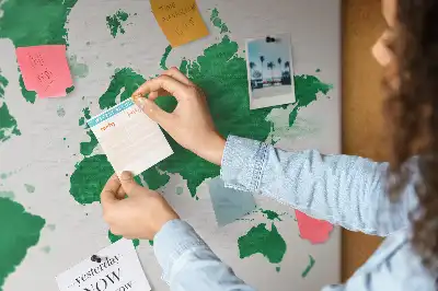 Cork memo board with a green world map print