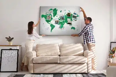 Cork memo board with a green world map print