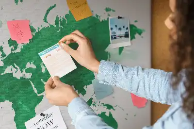 Cork memo board with a green world map print