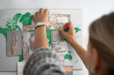 Cork memo board with a green world map print