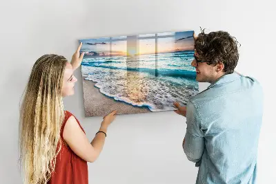Magnetic wall board with a beach, sea, and sand print