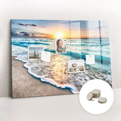 Magnetic wall board with a beach, sea, and sand print