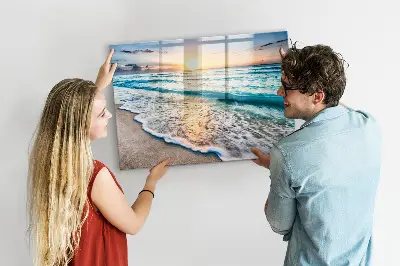 Magnetic wall board with a beach, sea, and sand print