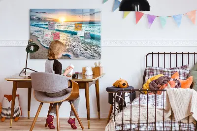 Magnetic wall board with a beach, sea, and sand print