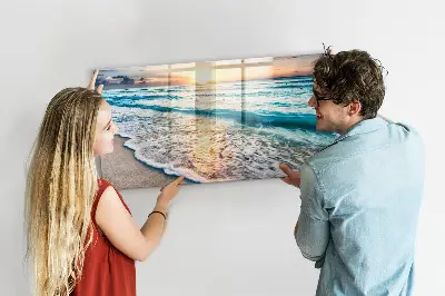 Magnetic wall board with a beach, sea, and sand print