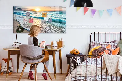 Magnetic wall board with a beach, sea, and sand print