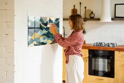 Magnetic wall board with illustrative mountains design
