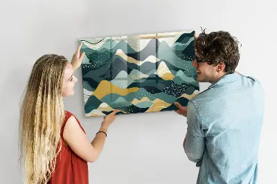 Magnetic wall board with illustrative mountains design