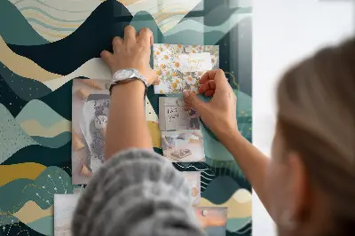 Magnetic wall board with illustrative mountains design