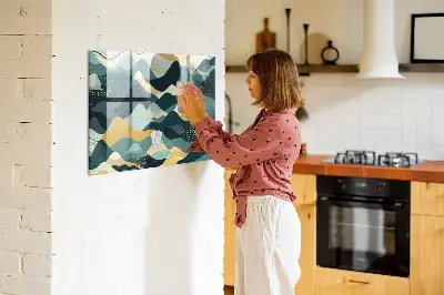 Magnetic wall board with illustrative mountains design